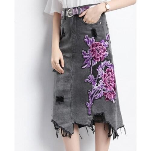 High Waist Floral Embroidery Hole Ripped Women Denim Skirts Fashion Irregular Tassel Knee Length Female A-Line Skirts Plus Size