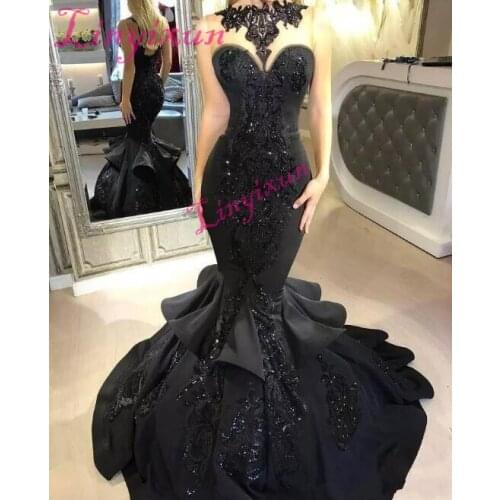 Stunning Black Long Prom Dresses 2018 Sexy Beaded Appliqued Cascading Ruffled Mermaid Court Train Backless Formal Evening Gown
