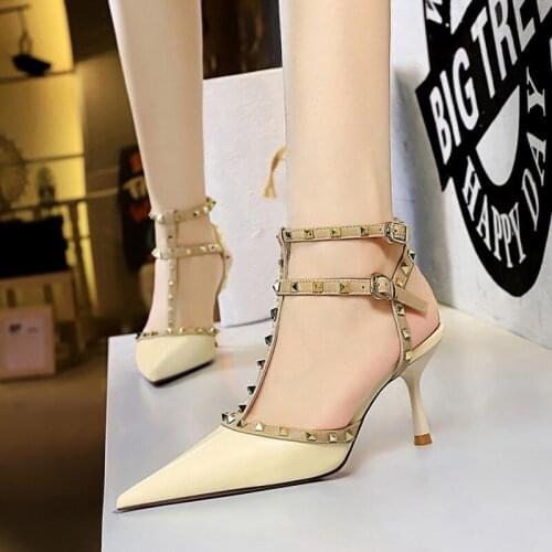 Sexy Club Shows Thin High Heel Shallow Mouth Pointed Hollow Out Roman Style Metal Rivets Female Sandals