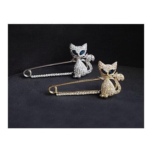 Japan and South Korea jewelry lovely green eyes shining female kitten brooch inlaid Fangzuan wholesale