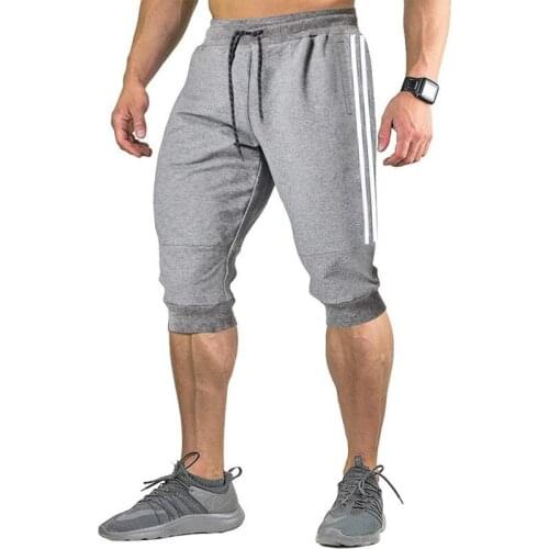 Mens Five-point Sweatpants Summer Pocket Design Elastic Band Shorts Solid Color Sports Pants 2021 Male Gym Running Loose Short
