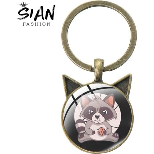 SIAN Raccoon Key Chain Wild Animal Printed Metal Key Chain Fashion Cat Ears Shaped Glass Cabochon Pendant Man And Woman Trinket