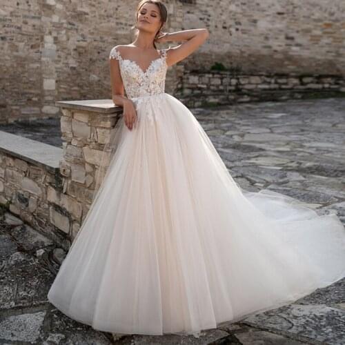 Hot Sale Cap Sleeve Beach Wedding Dresses 2021 Appliques Tulle A-line Court Train Bridal Gowns Robes De Mariage