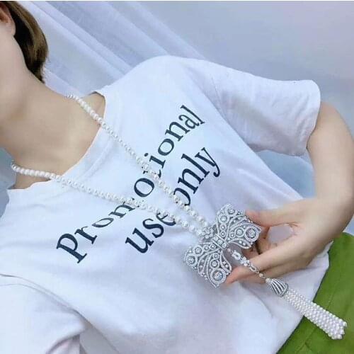 Hand knotting womens jewelry micro inlaid zircon bowknot accessories white freshwater pearl stone tassels necklace