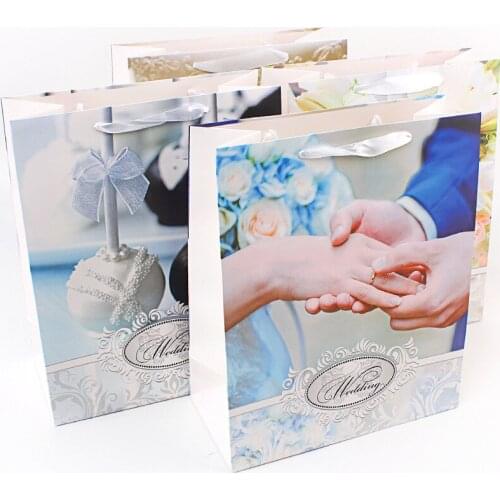 12pcs European and American fashion wedding white card gift bag clothing packaging bags party favors decoration pouch