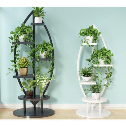 The living room household use pattern rack is multilayer indoor special price buy content rack saves the space indoor balcony de