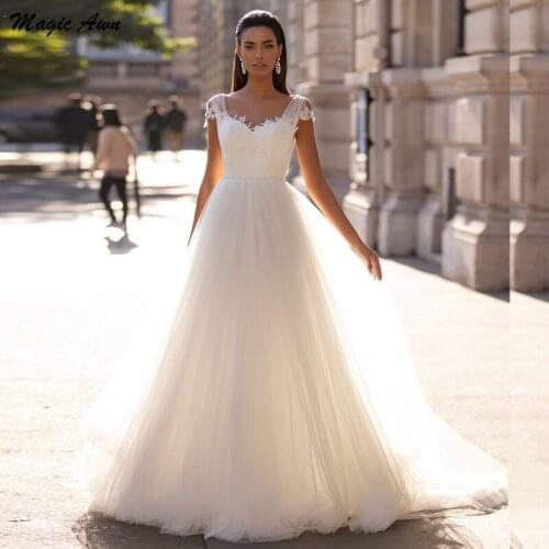 Magic Awn 2021 Elegnat Wedding Dresses Lace Appliques Sheer Scoop Backless Beach A-Line Mariage Gowns Princess Vestidos De Novia