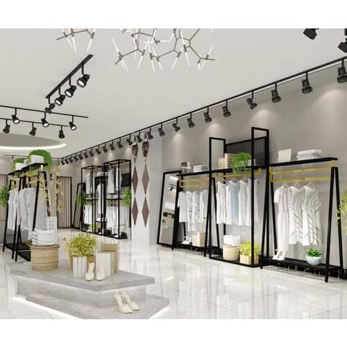 New fashion clothing store showcases floor-mounted mens and womens wear on display