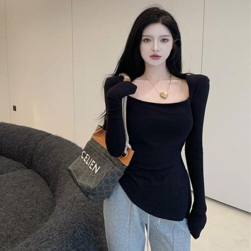 Spot Chinese new femininity fashion design sense square collar clavicle pure color fork irregular long sleeve T-shirt