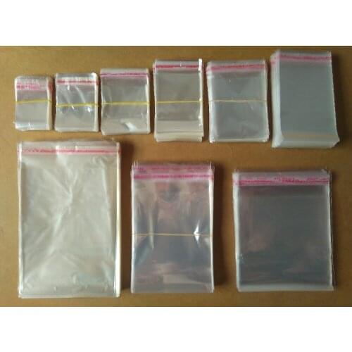 Free shipping 100pcs 20x29cm/18x34cm/20x34cm/ 22x34cm/ 24x34cm/ 25x39cm Clear Self Adhesive Seal Plastic Packaging Bag OPP pouch
