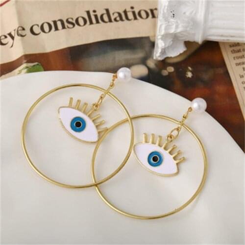 European and American cross-border new five pearl eye earrings creative retro double peach heart pendant earrings ear jewelry