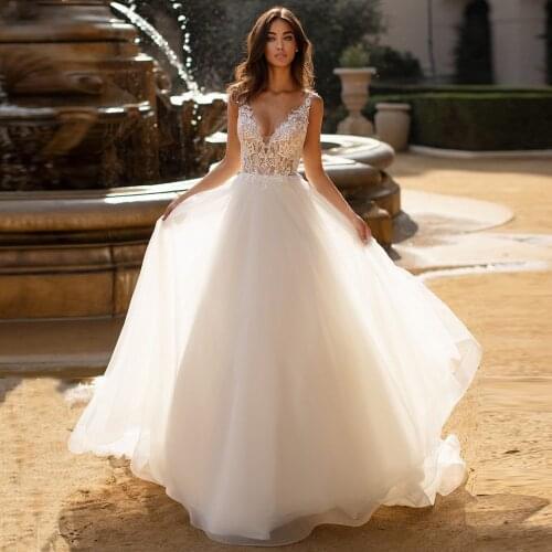 Sexy Backless Wedding Dresses Vestido De Noiva ep V-neck Illlusion Lace Applique Tulle Bridal Gowns Robe Mariee