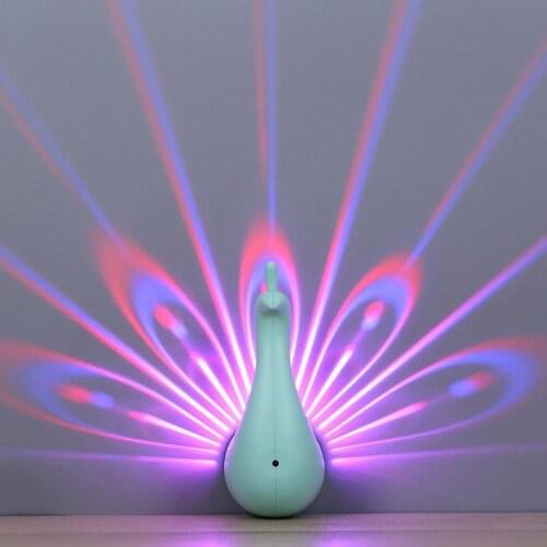 Creative peacock projection Nightlight new strange USB romantic creative home gift small wall lamp