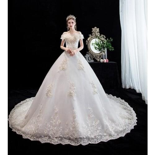 Wedding Dress 2021 New Boat Neck Lace Up Ball Gown Off The Shoulder Princess Luxury Vestido De Noiva With 1m Train Customize