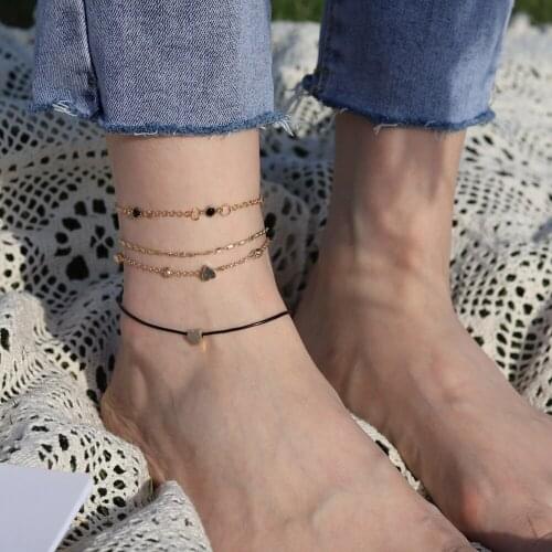 Boho New Womens Love Multilayer Anklet Set for Women Black Weaving Charms Beaded Anklet Foot Chain Jewelry 4pcs