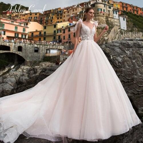Ashley Carol A-Line Wedding Dress 2021 Romantic Pearls Tulle Princess Bride Backless V-Neck Appliques Beach Boho Bridal Gown