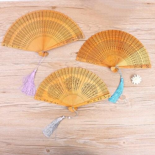 Chinese wind folding fan custom women with pendant classic portable fan gift fan high quality fan chinese folding fan
