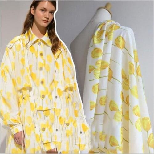 Europe and the United States new imitation cotton fabric fashion secret bamboo printing yellow carnation fabric dress fabric