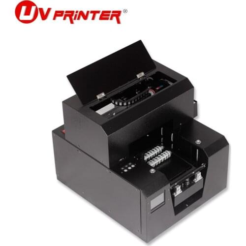 Portable 6-color inkjet printer with touch screen design with free rotating roller for printing flat and cylindrical objects