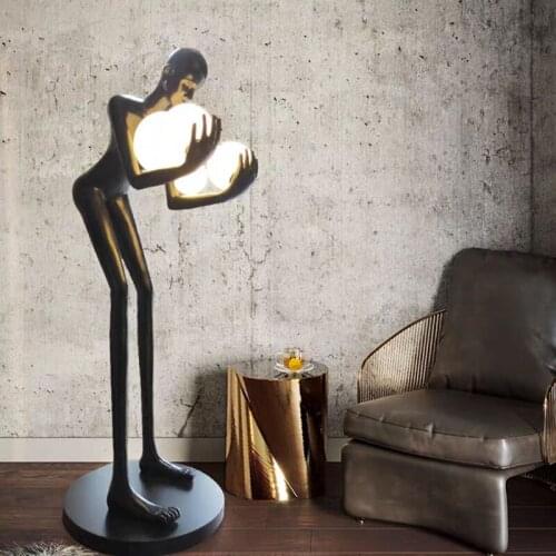 Postmodern humanoid sculpture holding ball floor lamp hotel lobby living room creative large floor lamp