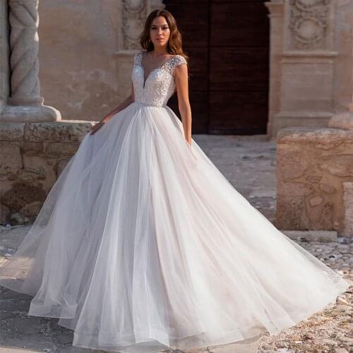 Vestidos De Noiva Luxury Ball Gown Wedding Dress Beading Pearls Bodice Suknia Slubna Illusion Back Robe De Soirée De Mariage