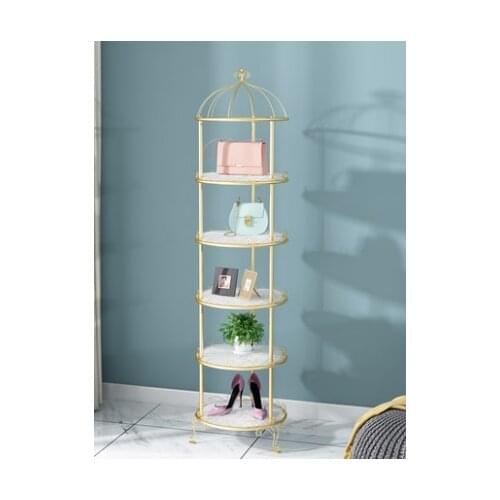 Bags shelf in the window of clothing and shoe store