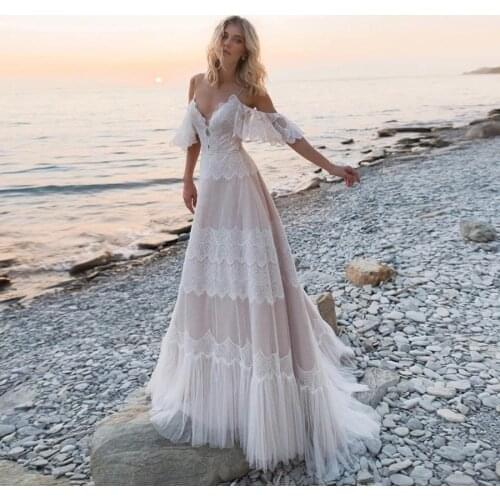 Backless Wedding Dresses A-line Spaghetti Straps Tulle Lace Beach Boho Dubai Arabic Wedding Gown Bridal Dress Vestido De Noiva