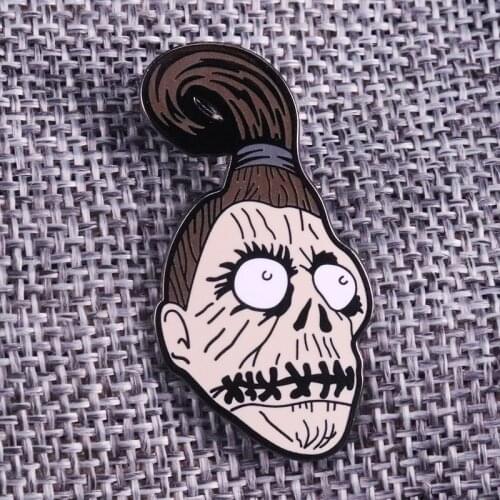 Shrunken head Pin brooch