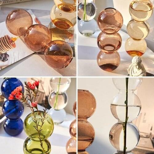 Innovative And Beautiful Transparent Colored Glass Small Decorative Vase Simple High-end Home Decoration Bottle
