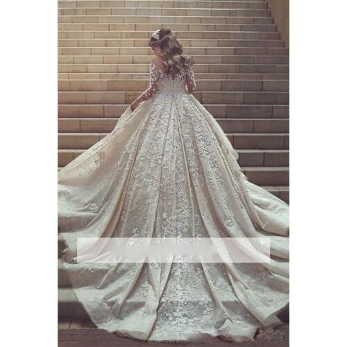 2018 New Gorgeous Sheer Neck Lace Wedding Dresses Long train Long Sleeves Crystals Ruffles Appliques Tulle Wedding Dresses