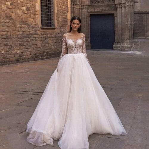 Modern Long Sleeve Lace Wedding Dress 2021 Beads Ball Gown Bride Dresses Illusion Back Vintage Wedding Gowns Robe de Mariee