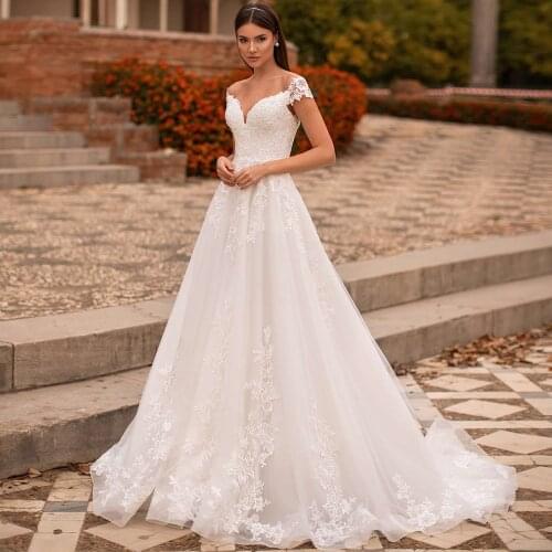 Luxury A-line Wedding Dress With Lace Appliques Off-the-shoulder Tulle Lace Up Princess Bridal Dress Robe De Mariee