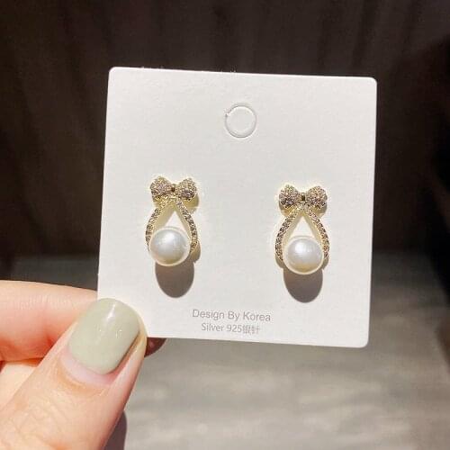 Korean Fashion Woman Earrings Gold Color Plated Cubic Zirconia Bowknot Stud Earrings Imitation Pearl Jewelry