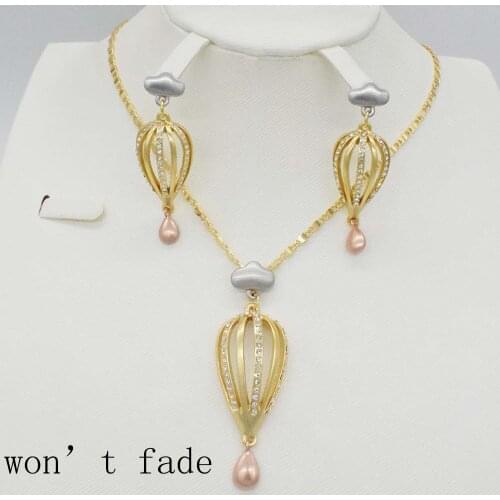 2018 NEW unique gold necklace collocation fashion circular pendant earrings jewelry for women in Dubai Will not fade SET