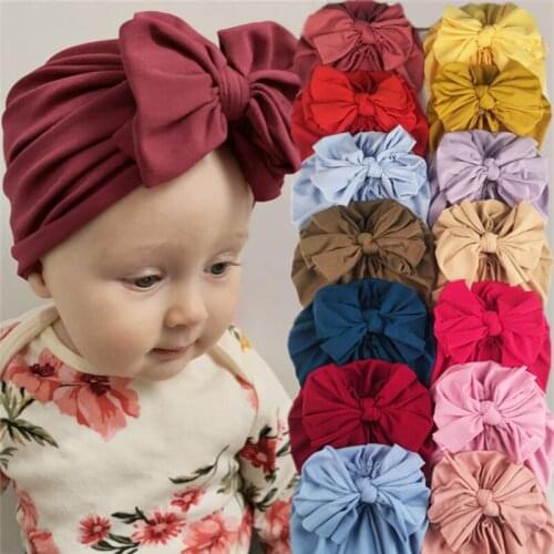 2021 Soft Newborn Props Beanie Cap Knotted Bow Solid Color Infant Girl Headwrap Fashion Toddler Bonnet Baby Girl Hat Headwear