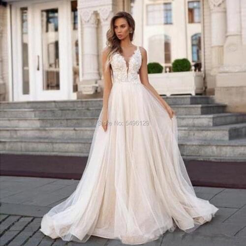 Vestido de Noiva A Line V Neckline Champagne Wedding Dresses Lace Appliques Blinking Bling Tulle Floor Length Turkey Bridal Gown