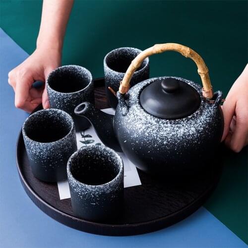 Guopin Japanese style tea set teapot ceramic household tea maker drinking tea cup single pot creative bamboo handle por