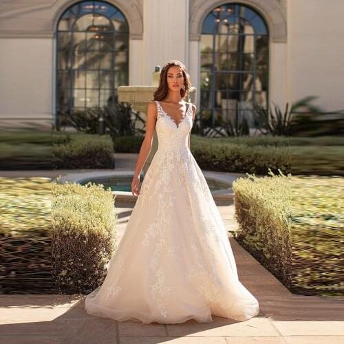 Charming On Sale A Line Lace Sleeveless Bridal Wedding Gowns Back Out Deep V Neckline Wedding Dresses for Bride Appliqued 2020