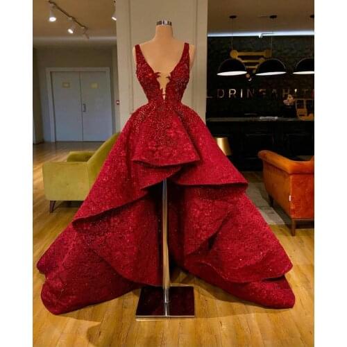2020 Luxury Red Prom Dresses Deep V Neck Lace Appliqued Bead Formal Dress Custom Made High Low Evening Gowns Party Wear