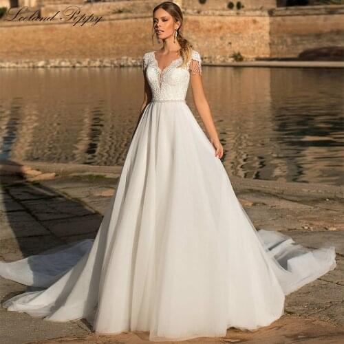 Lceland Poppy Elegant V Neck Tulle Wedding Dresses 2021 Sleeveless Pearls Beaded Vestido de Novia Bridal Gowns with Chapel Train