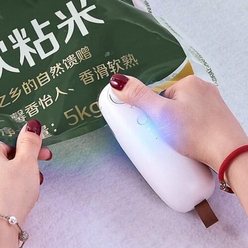USB charging sealing machine hand pressure portable mini heating plastic packaging machine handheld vacuum food sealing device