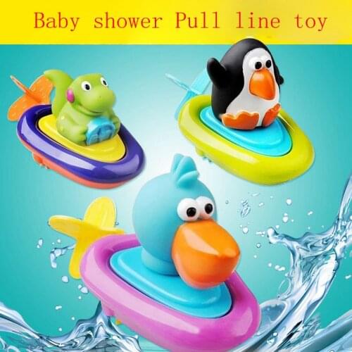 Top quality Pull line boat bath toy baby backguy Play in water clockwork baby toy swim water toys children Wound-up Doll gift