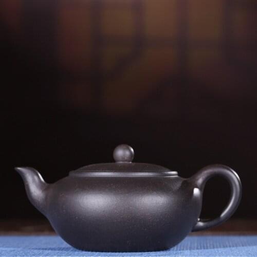 Yixing recommended authentic handmade undressed ore just flat black mud black gold zhu okho kung fu tea tea set gift