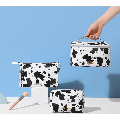 Large-capacity PU waterproof cosmetic bag, convenient for travel, milk pattern cosmetic storage bag, female toiletry bag