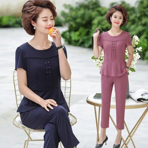 2020 Solid color all-match comfortable casual womens two-piece set summer new short-sleeved shirt + nine pants sweat suits
