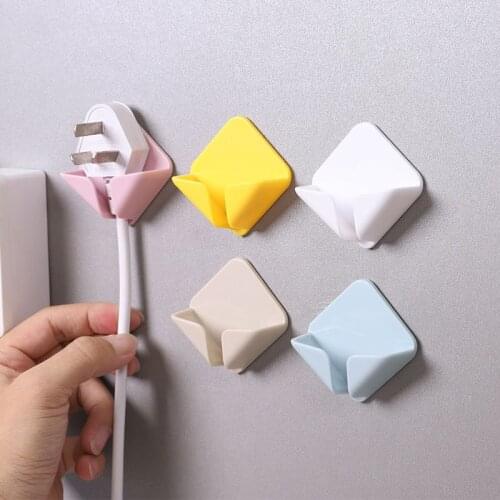 Multi-function plug hook no hole plug holder socket multi-function wire finishing bracket strong paste