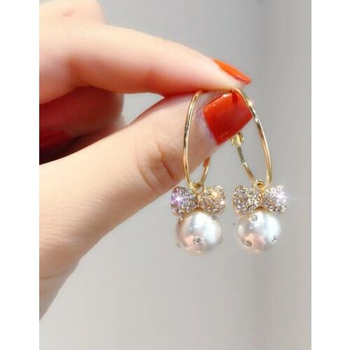 Sweet Girl Earrings Korean Fashion New Temperament Earrings Wild Net Red Crystal Bow Pearl Earrings Womens Wholesale Orecchini
