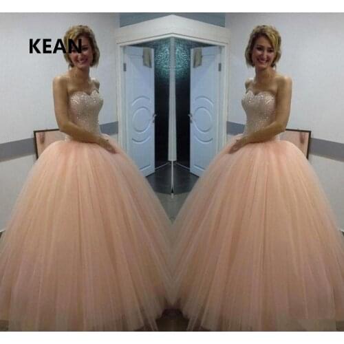 Peach Quinceanera Dresses Ball Gown Strapless Tulle Sequins Beaded Sweet 16 Dresses Champagne Graduation Gown