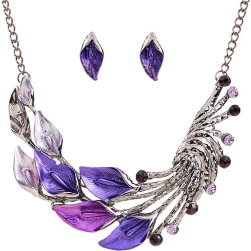Hot sale retro necklace earrings color dripping oil zircon curved leaf sweater chain short suit wholesale