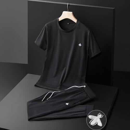 Summer ice silk leisure sports suit mens trend wild ice short-sleeved loose nine-point pants mens two-piece suit